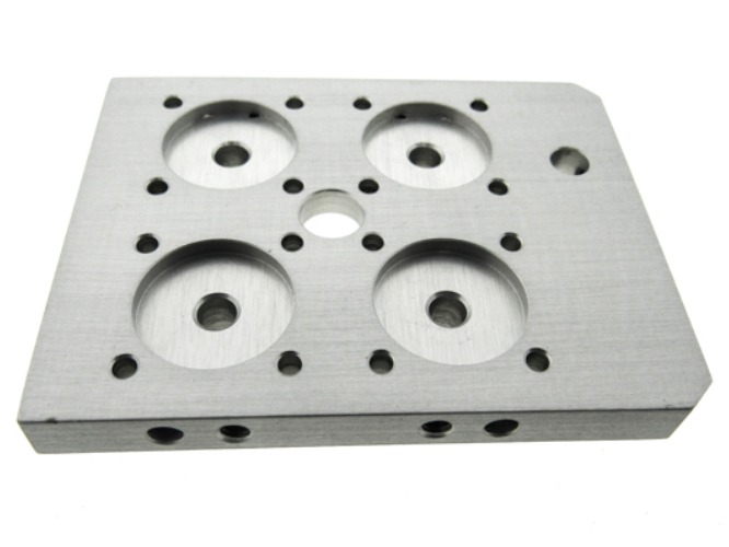 A standoff plate is used to create spacing between components, ensuring proper alignment and preventing contact. It helps in mounting or securing parts while maintaining necessary clearance.